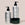 Acure Organics skincare products including body wash, lotion, and scrub on a beige background